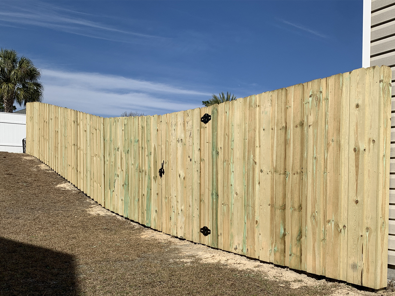 Photo of a wood privacy fence and gate