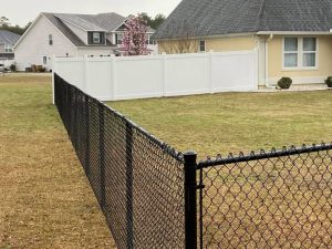 Photo of a black pvc chain link fence