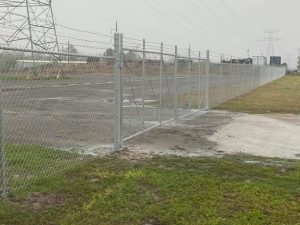 Photo of chain link fence with barbed wire